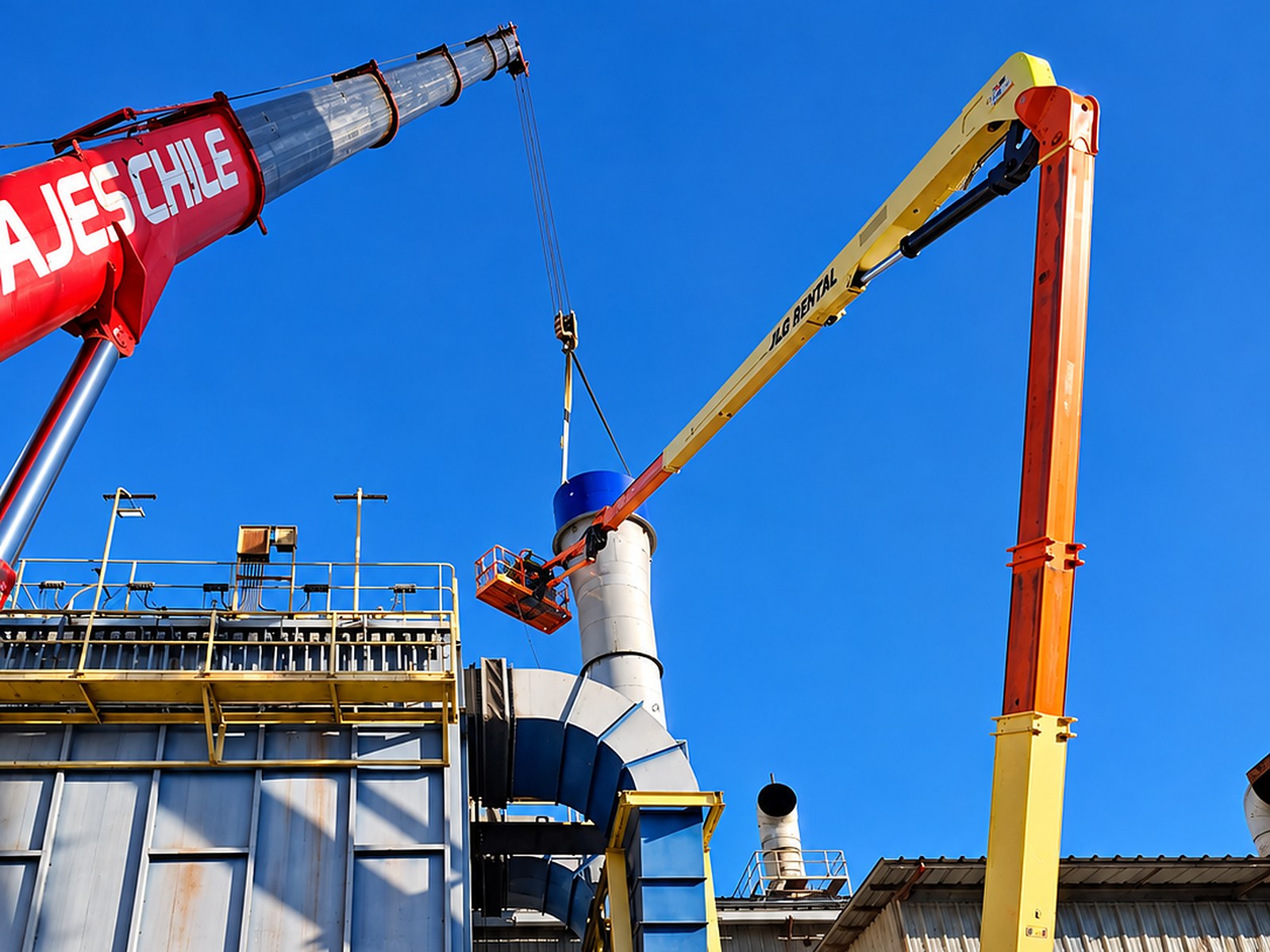 Montaje en terreno con plataforma elevadora y grúa instalando un ducto industrial